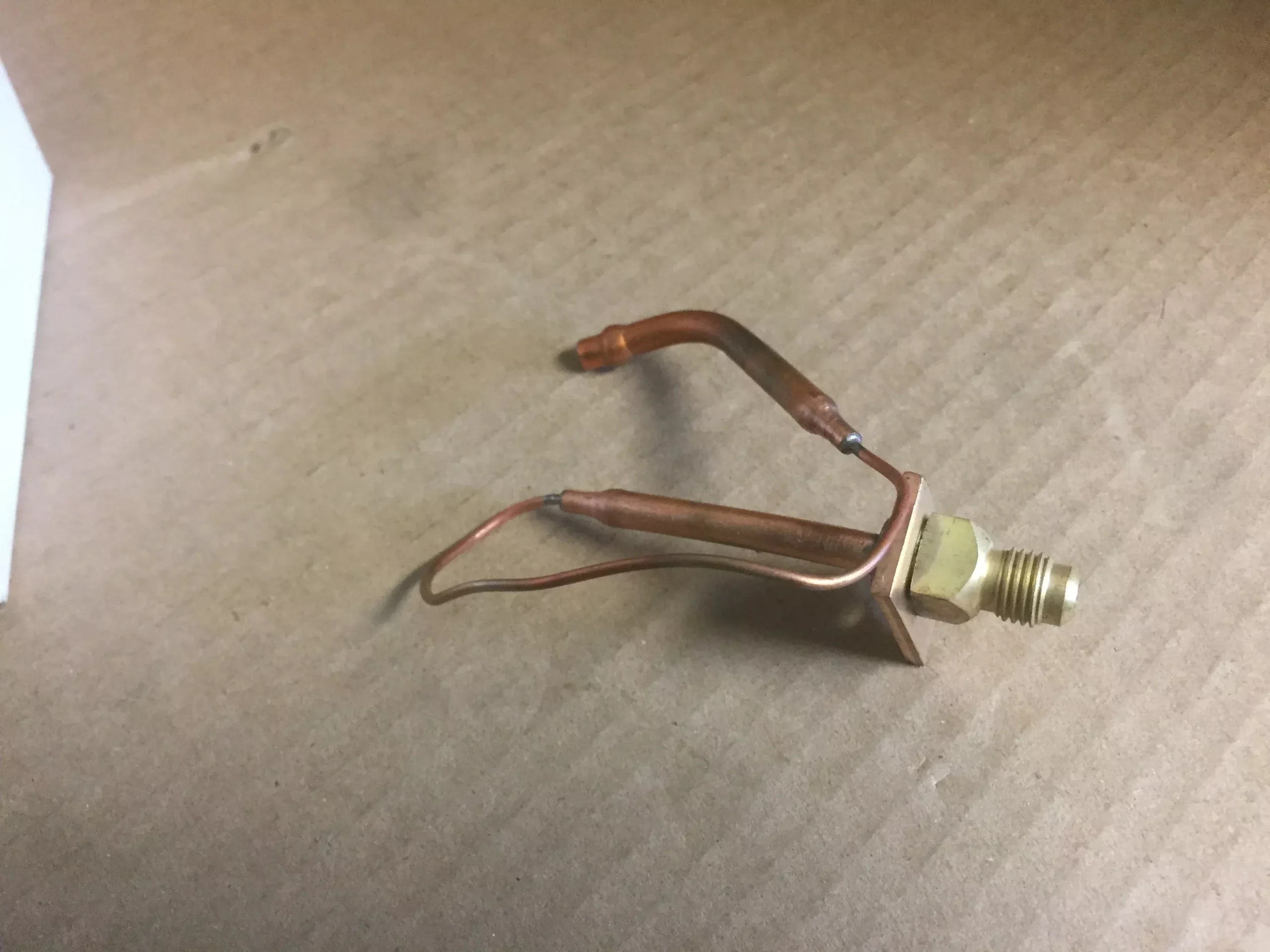 Valve Body Charge Port Assembly